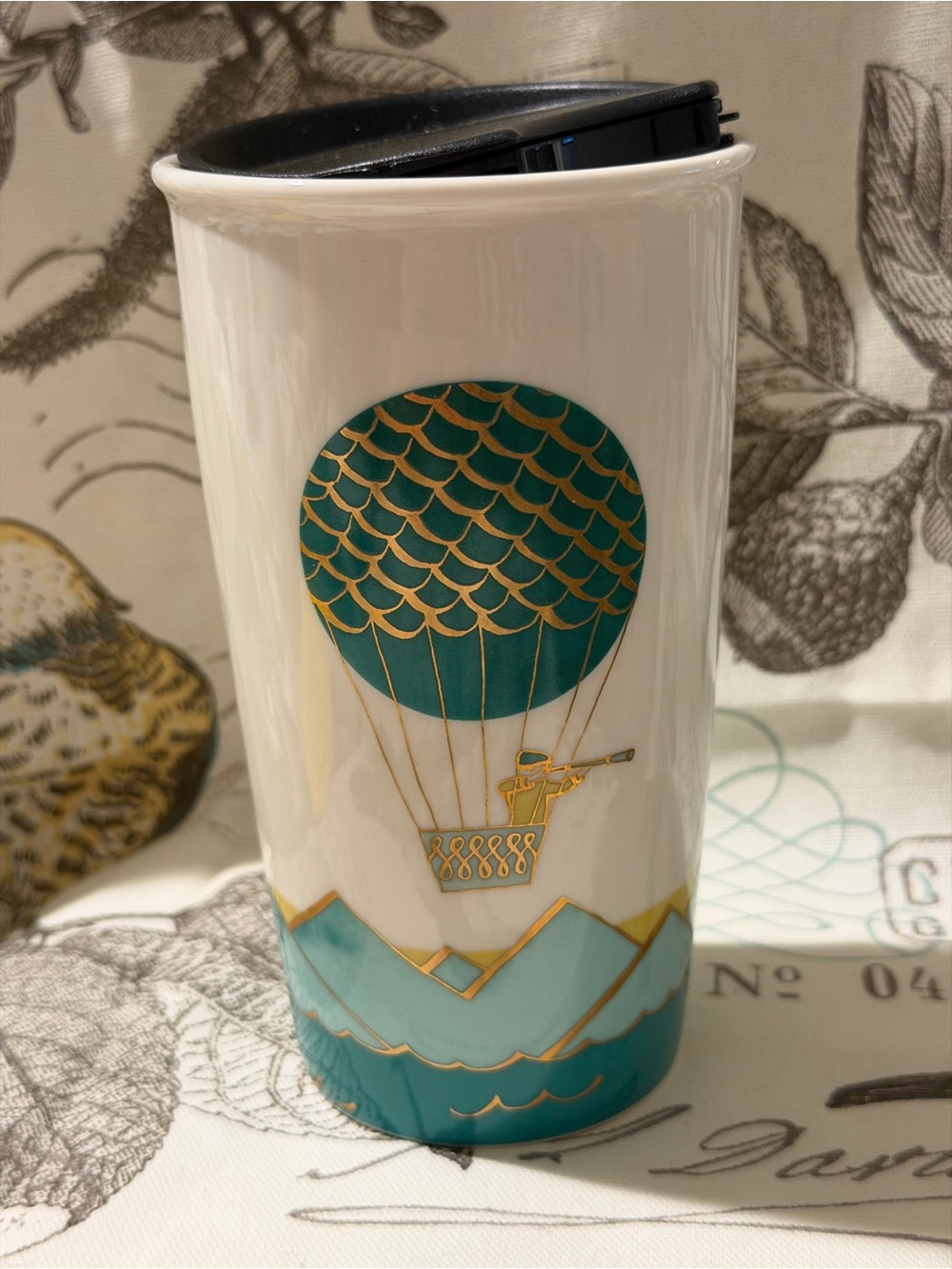 Starbucks White Ceramic Travel Mug with Teal and Gold Hot Air Balloon